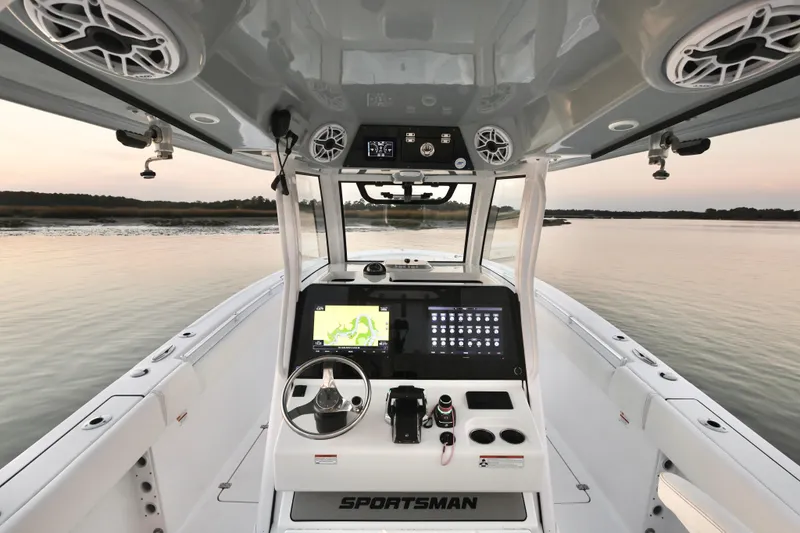 Slide: The Image of 2022 Sportsman Open 322 Center Console boat interior with advanced navigation system. - 16
