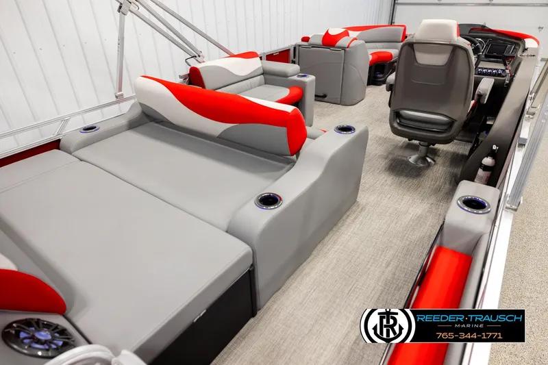 Slide: The Image of Luxurious interior of 2026 Avalon LSZ Vrl pontoon boat with red and gray seating. - 12