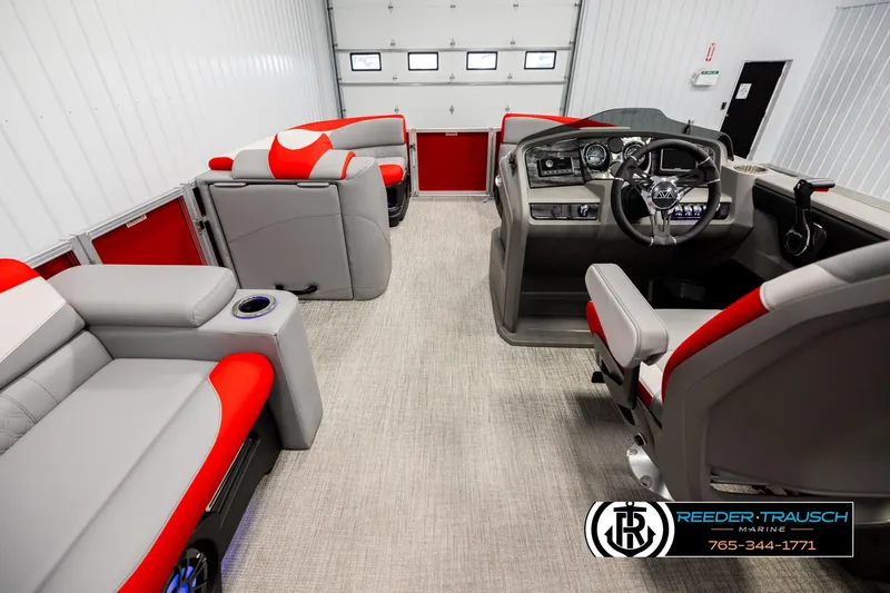 Slide: The Image of 2026 Avalon LSZ Vrl boat interior with modern seating and control panel in showroom. - 17