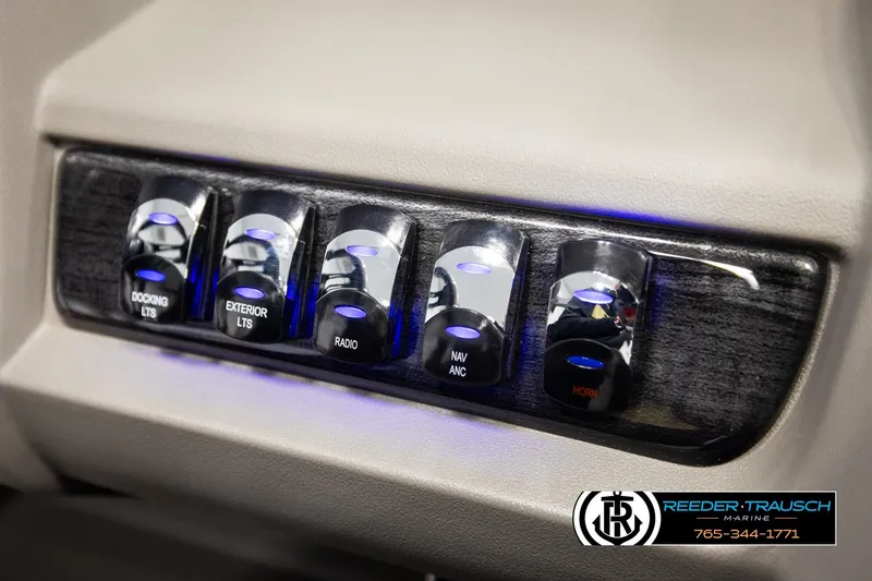 Slide: The Image of Control panel of 2026 Avalon LSZ Vrl boat with illuminated switches. - 37