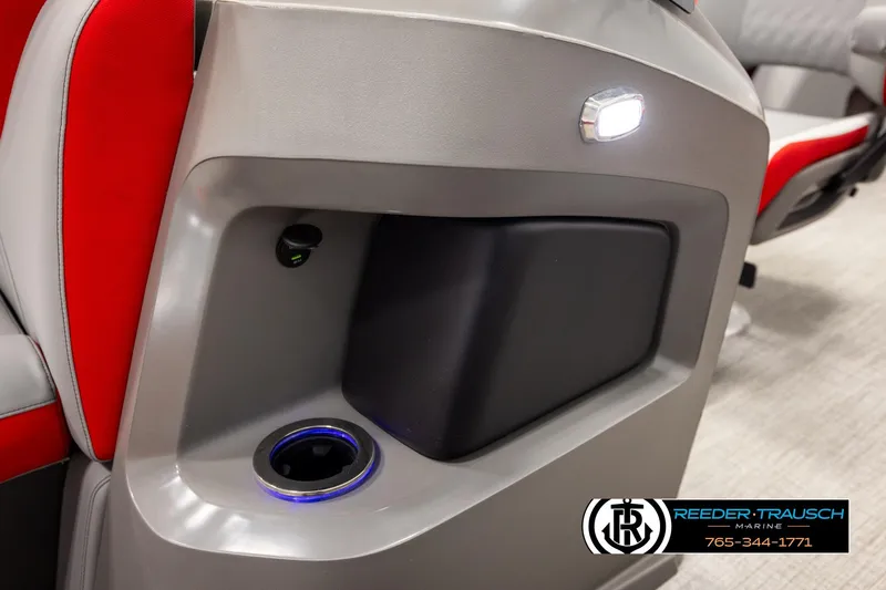 Slide: The Image of 2026 Avalon LSZ Vrl boat interior with cup holder and LED lighting. - 43