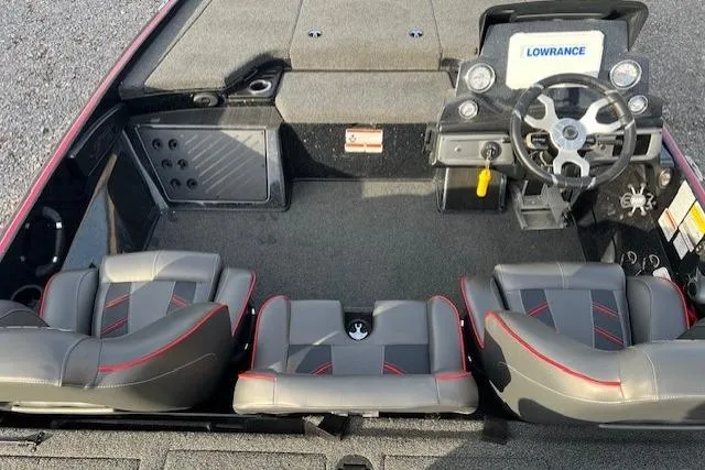 Slide: The Image of 2023 Nitro Z19 boat interior with steering console and seating. - 4