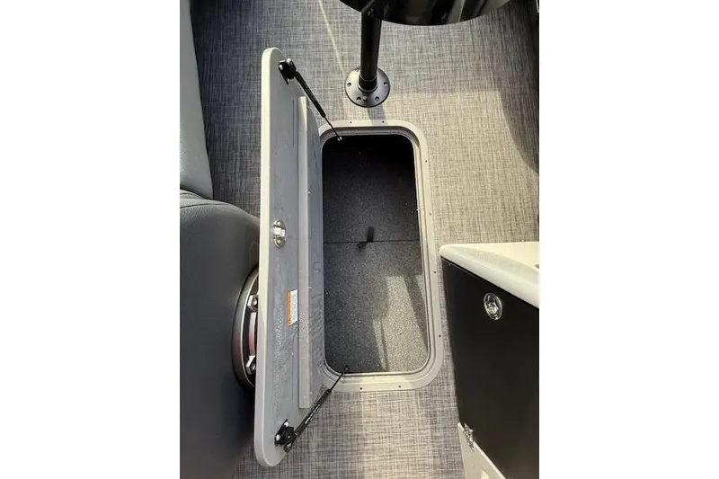 Slide: The Image of Luxurious seating area of 2026 SunCatcher Diamond Elite 324 SL pontoon boat with stylish table. - 21