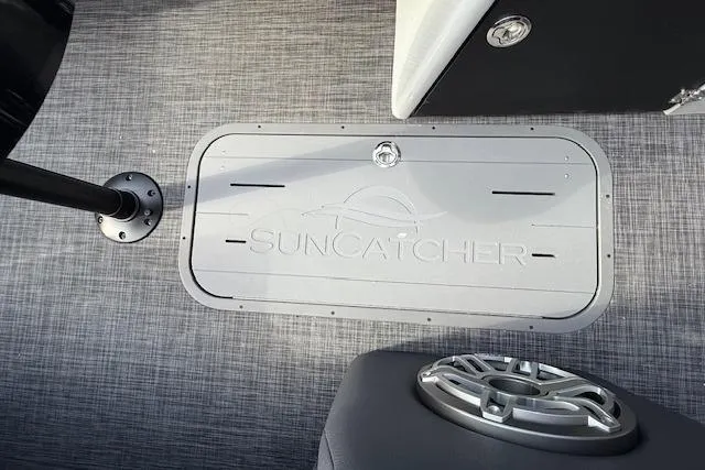 Slide: The Image of 2026 SunCatcher Diamond Elite 324 SL boat interior with luxurious seating and modern design. - 22