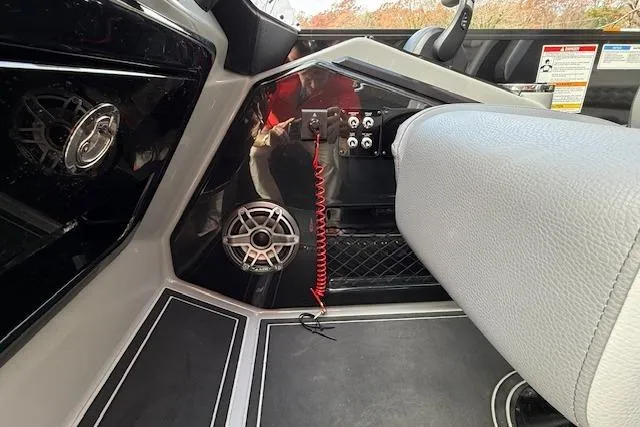 Slide: The Image of Luxury interior of 2026 SunCatcher Diamond Elite 324 SL pontoon boat with plush seating. - 23