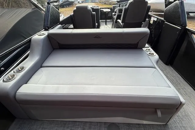 Slide: The Image of 2026 SunCatcher Diamond Elite 324 SL boat interior with Garmin navigation system. - 26