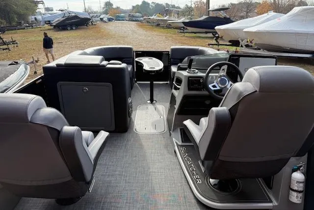 Slide: The Image of Manufacturer Provided Image: 2026 SunCatcher Diamond Elite 324 SL boat cockpit with modern steering and controls. - 29