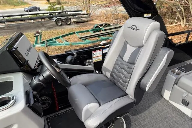 Slide: The Image of Manufacturer Provided Image: 2026 SunCatcher Diamond Elite 324 SL boat interior with gray seating and cup holders. - 38