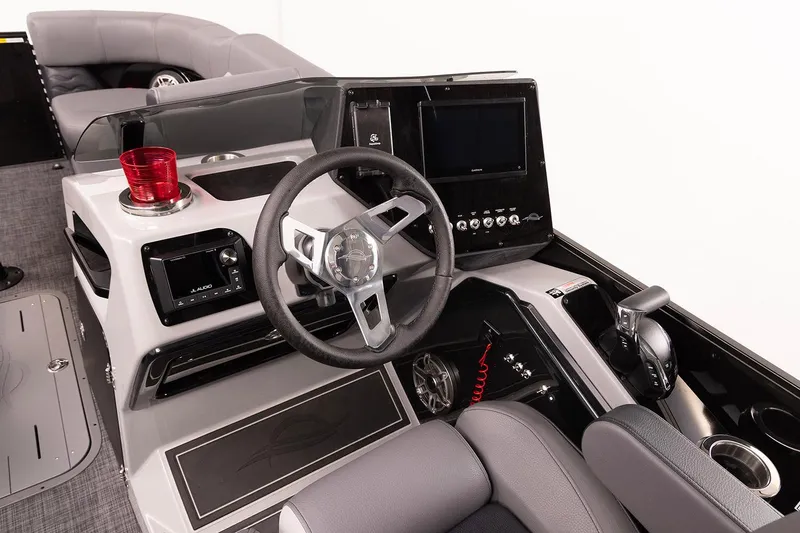 Slide: The Image of 2026 SunCatcher Diamond Elite 324 SL boat interior with luxurious gray seating. - 8