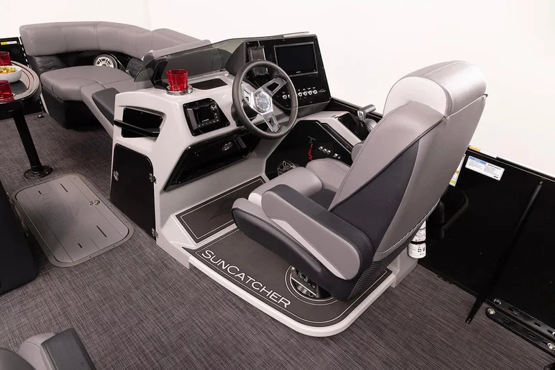 Slide: The Image of Luxurious interior of 2026 SunCatcher Diamond Elite 324 SL pontoon boat with stylish seating and table. - 9