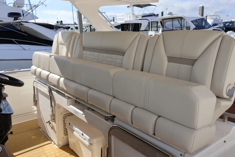 Slide: The Image of Luxurious seating on 2023 Tiara Yachts 43 LS, featuring elegant beige upholstery. - 37