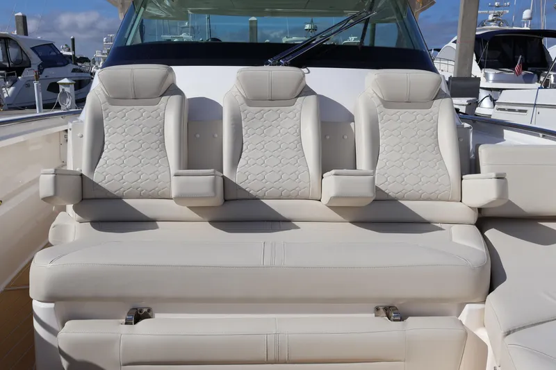 Slide: The Image of Luxurious seating on 2023 Tiara Yachts 43 LS, featuring elegant beige upholstery. - 53