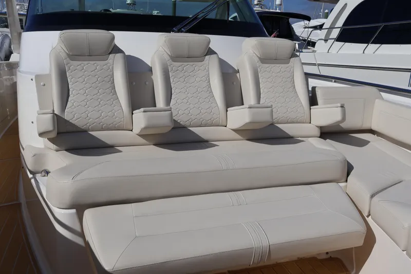 Slide: The Image of 2023 Tiara Yachts 43 LS luxury seating with beige upholstery and modern design. - 55