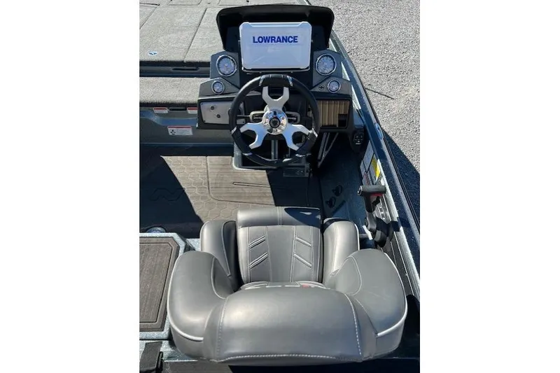 Slide: The Image of 2024 Nitro Z21 boat cockpit with Lowrance display and steering wheel. - 5