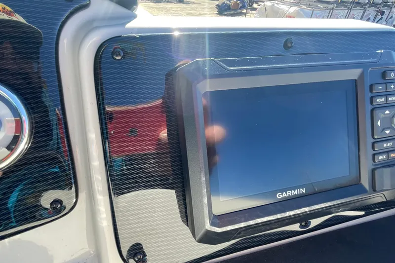 Slide: The Image of Dashboard of 2026 SunCatcher Select 322SL with Clarion audio system and AquaAmp device. - 10