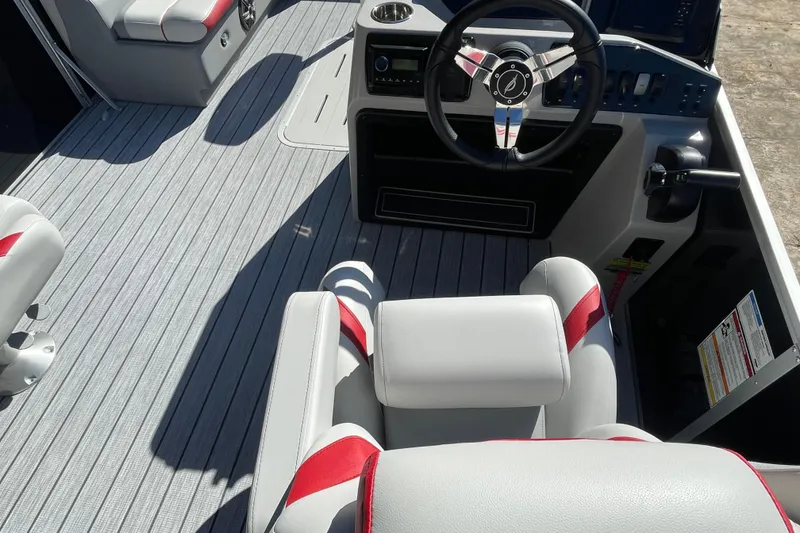 Slide: The Image of 2026 SunCatcher Select 322SL boat ignition switch with Yamaha branding and capacity label. - 13