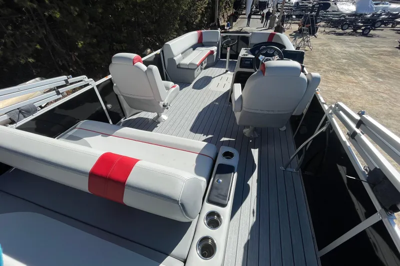 Slide: The Image of 2026 SunCatcher Select 322SL pontoon boat with Yamaha SHO VMAX engine, ladder, and canopy. - 21