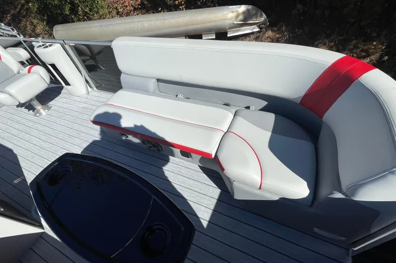 Slide: The Image of Manufacturer Provided Image: 2026 SunCatcher Select 322SL boat interior with cushioned seating and modern design. - 26