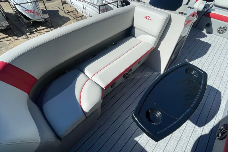 Slide: The Image of 2026 SunCatcher Select 322SL pontoon boat interior with seating and table. - 5