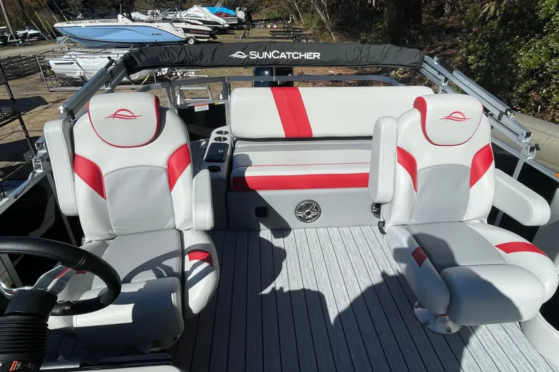 Slide: The Image of Garmin display on 2026 SunCatcher Select 322SL boat dashboard. - 8