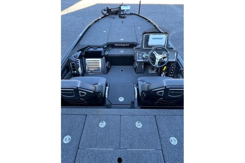 Slide: The Image of 2024 Ranger Z521R boat interior with advanced navigation system and spacious seating. - 2