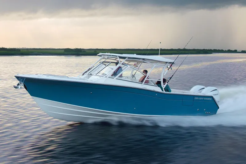 The Image of Manufacturer Provided Image: 2022 Grady-White Freedom 307 boat cruising on water. - 2
