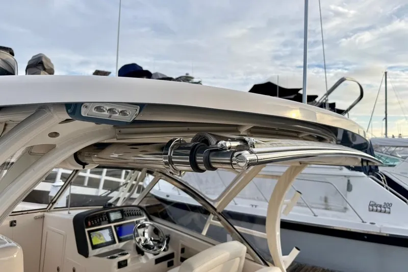 Slide: The Image of 2022 Grady-White Freedom 307 boat interior with advanced navigation system and sleek design. - 28