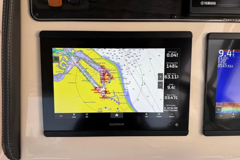 Slide: The Image of Garmin navigation display on 2022 Grady-White Freedom 307 boat dashboard. - 29