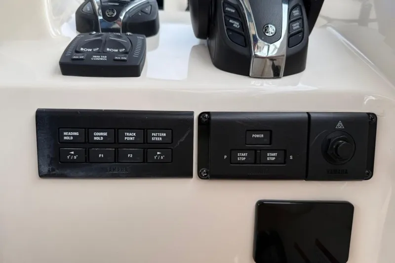 Slide: The Image of Control panel of 2022 Grady-White Freedom 307 boat with Yamaha controls. - 36