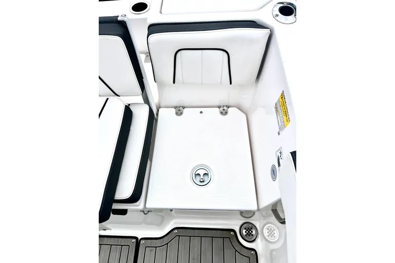 Slide: The Image of 2022 Yamaha Boats 255 FSH Sport H interior seating and storage area. - 23