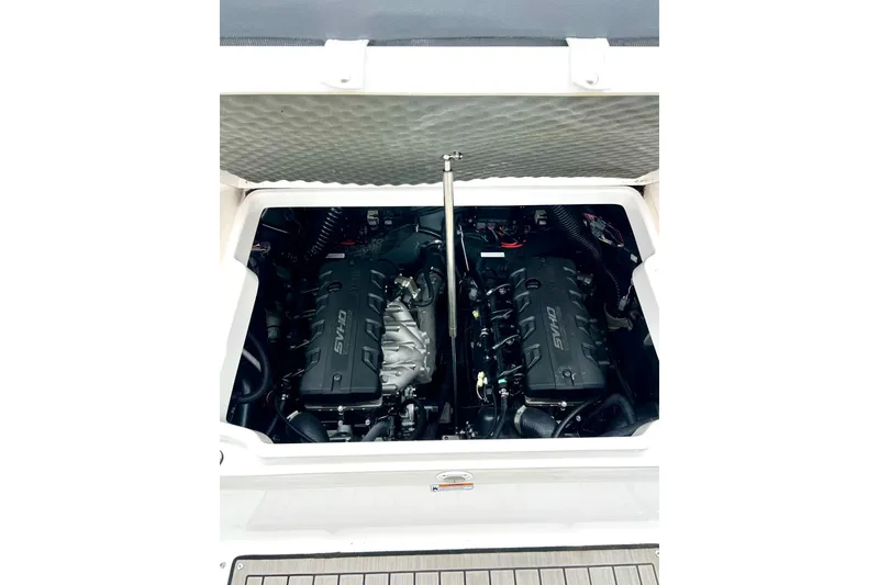 Slide: The Image of 2022 Yamaha Boats 255 FSH Sport H engine compartment with twin SVHO engines. - 30