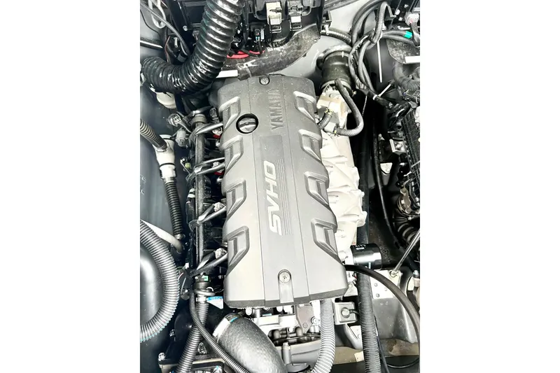 Slide: The Image of Engine of 2022 Yamaha Boats 255 FSH Sport H, showcasing intricate components and design. - 31