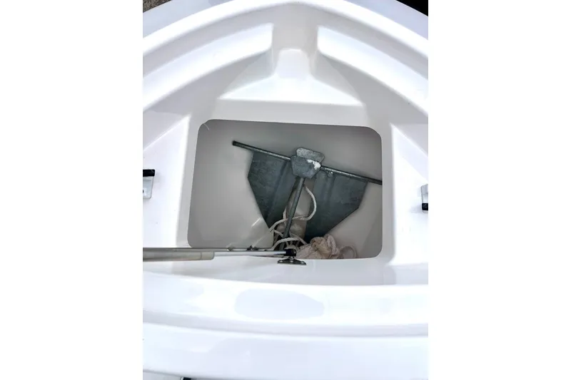 Slide: The Image of Anchor storage compartment on 2022 Yamaha Boats 255 FSH Sport H. - 59