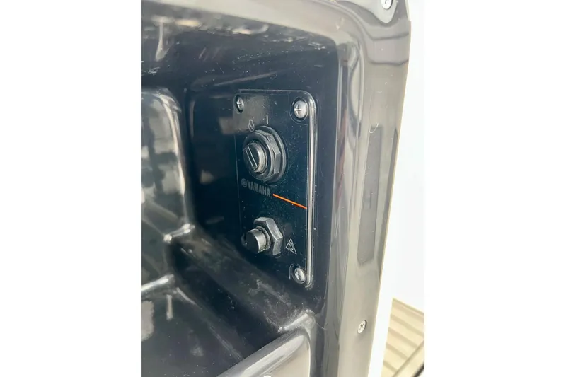 Slide: The Image of Close-up of Yamaha Boats 255 FSH Sport H 2022 control panel. - 70