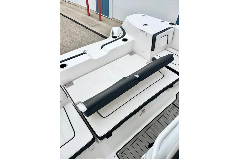 Slide: The Image of 2022 Yamaha Boats 255 FSH Sport H interior seating and storage area. - 74