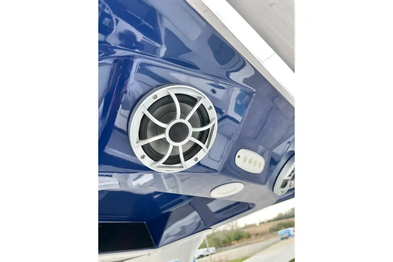 Slide: The Image of Close-up of Yamaha 255 FSH Sport H 2022 boat speaker system. - 75