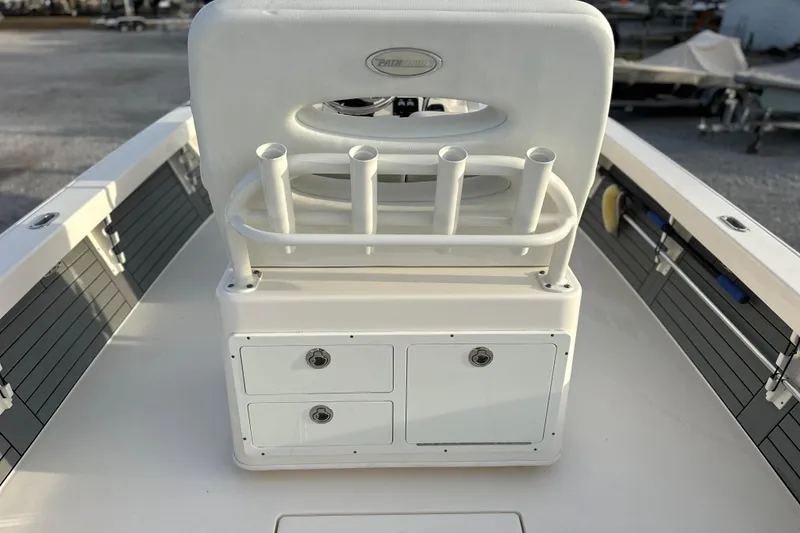 Slide: The Image of 2020 Pathfinder 2600 HPS boat with rod holders and storage compartments. - 15