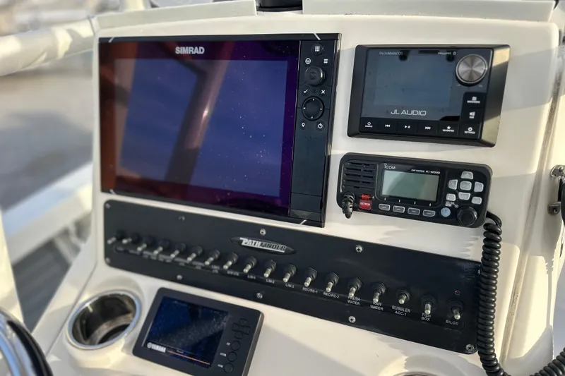Slide: The Image of Control panel of 2020 Pathfinder 2600 HPS boat with navigation and audio systems. - 20