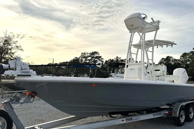 Slide: The Image of 2020 Pathfinder 2600 HPS boat on trailer, featuring Minn Kota trolling motor. - 9