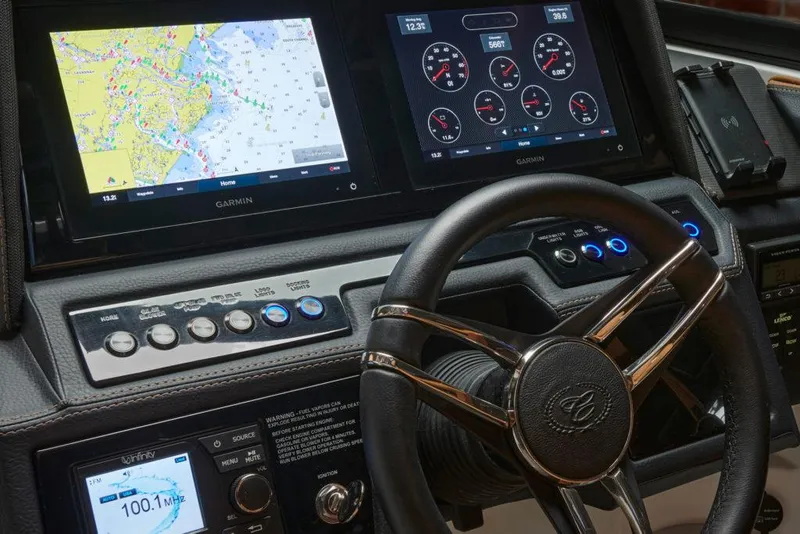 Slide: The Image of 2023 Cobalt R8 boat interior with gray seating and sleek design. - 10