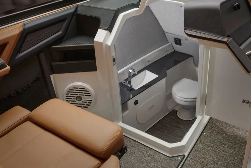 Slide: The Image of 2023 Cobalt R8 dashboard featuring dual Garmin displays and control panel. - 16