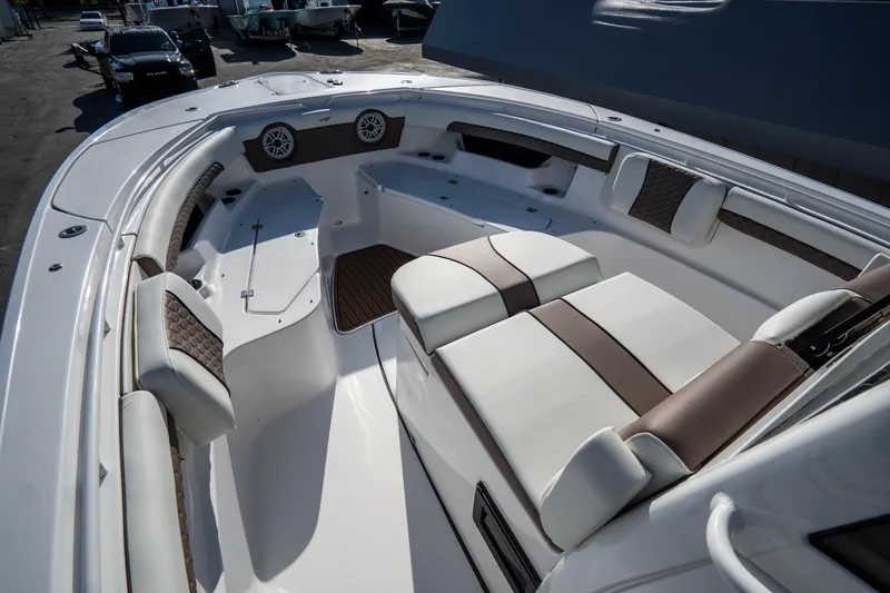 Slide: The Image of 2021 Tidewater 320 CC Adventure boat interior with waterfront view. - 34