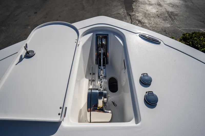Slide: The Image of Bow anchor compartment of 2021 Tidewater 320 CC Adventure boat. - 54