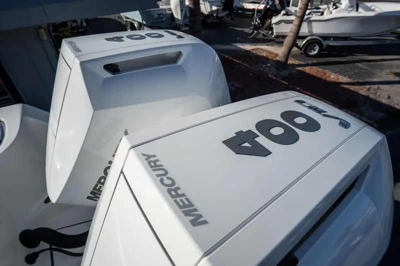 Slide: The Image of 2021 Tidewater 320 CC Adventure boat interior with sink and fan. - 61