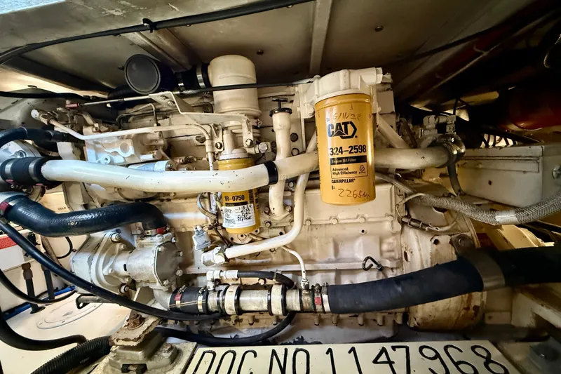 Slide: The Image of Engine room of a 1996 Egg Harbor 35 Sport Fisherman with CAT components. - 14