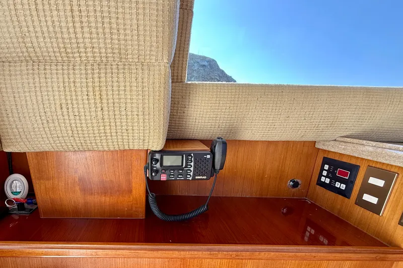 Slide: The Image of Interior of 1996 Egg Harbor 35 Sport Fisherman with radio and control panel. - 22