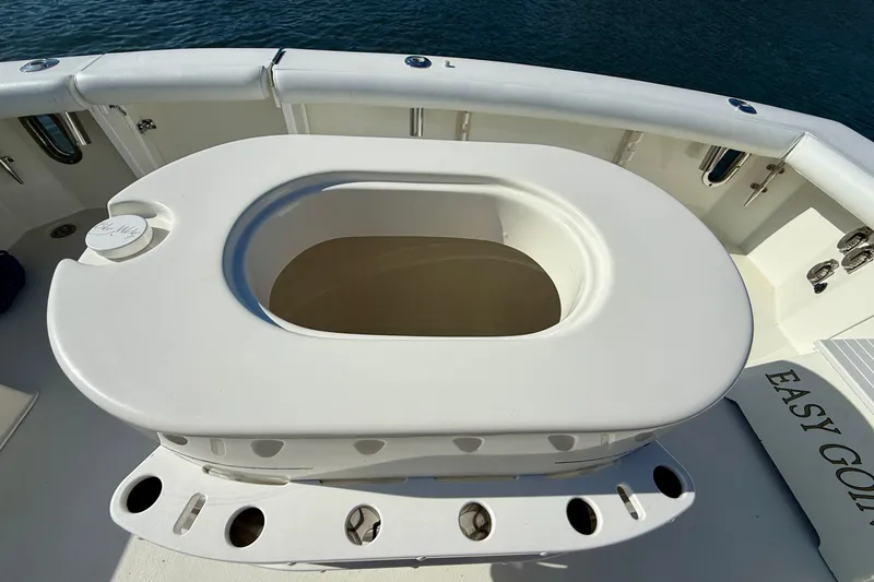 Slide: The Image of 1996 Egg Harbor 35 Sport Fisherman boat deck with fishing rod holders. - 49