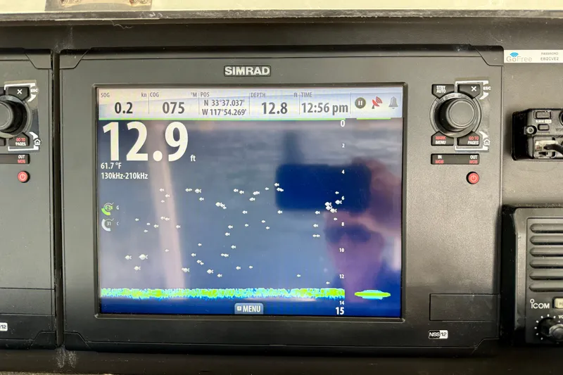 Slide: The Image of Simrad marine display on 1996 Egg Harbor 35 Sport Fisherman showing depth and sonar data. - 57