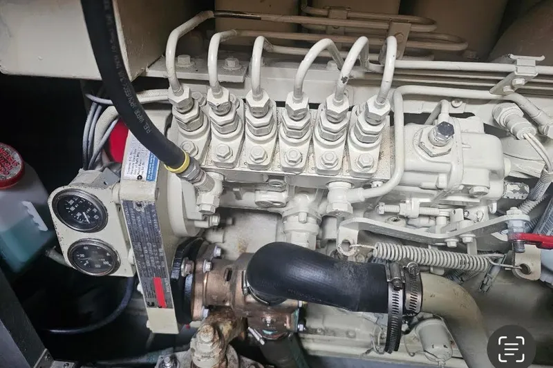 Slide: The Image of Engine components of a 1990 Sea Ray 380 Aft Cabin boat. - 15