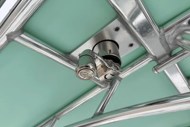 Slide: The Image of Stainless steel fitting on 2021 Contender 25 Tournament boat's green canopy frame. - 17